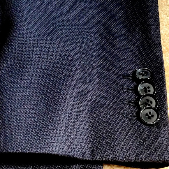 Classic tailored 100% cotton suit.